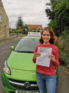 Emily with her pass certifcate